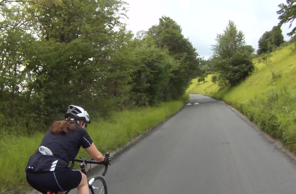 Audrey tackling Box Hill on her new bike "Emmy", an emerald-green touring bike from the Edinburgh Bicycle Coop